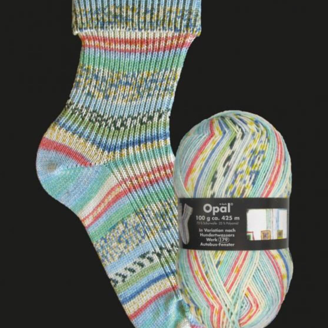 turquoise knitted sock in  multicoloured opal 4ply sock yarn wool inspired by the artist Hundertwasser