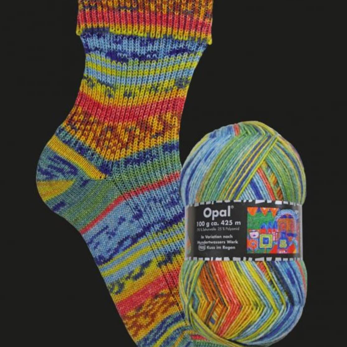 orange and blues knitted sock in  multicoloured opal 4ply sock yarn wool inspired by the artist Hundertwasser