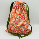 orange patterned drawstring project bags for knit crochet filled with 20 mini balls of Opal 4ply sock yarn