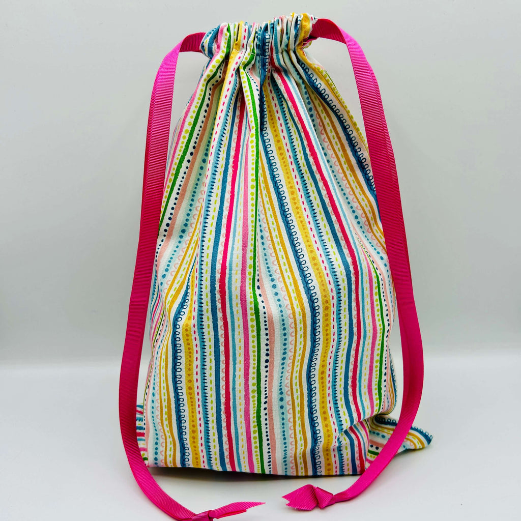 stripey patterned drawstring project bags for knit crochet filled with 20 mini balls of Opal 4ply sock yarn