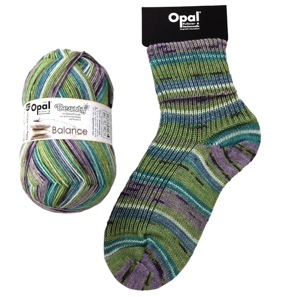 green and lilac  socks made in opal 4ply sock yarn wool for hand knit crochet socks