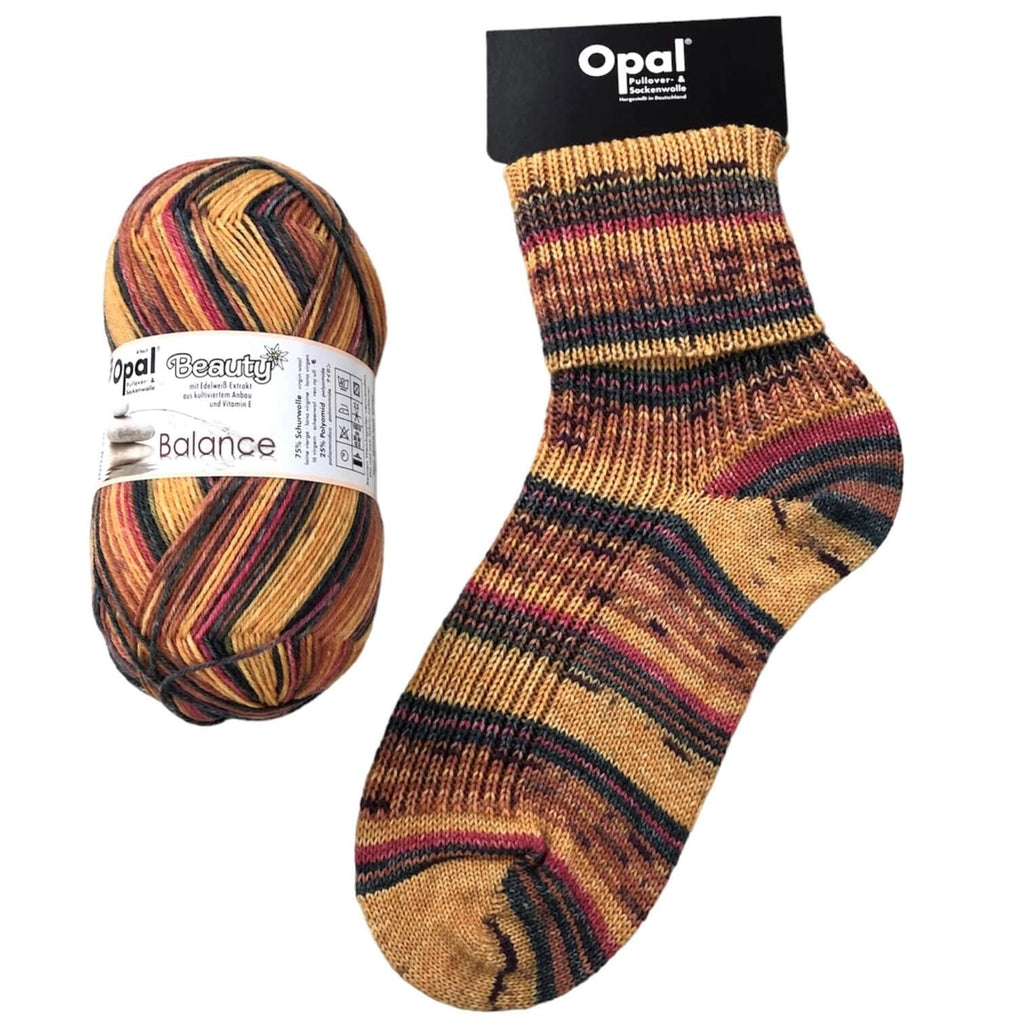 orange and brown  socks made in opal 4ply sock yarn wool for hand knit crochet socks