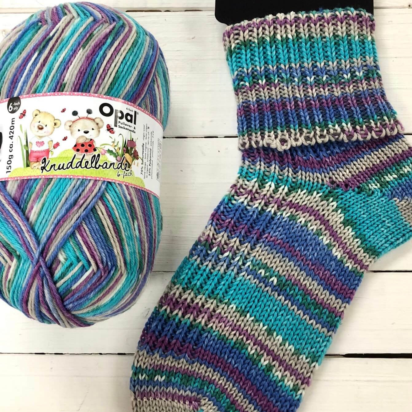 purple turquoise knitted sock multicoloured opal 6ply sock wool yarn 
