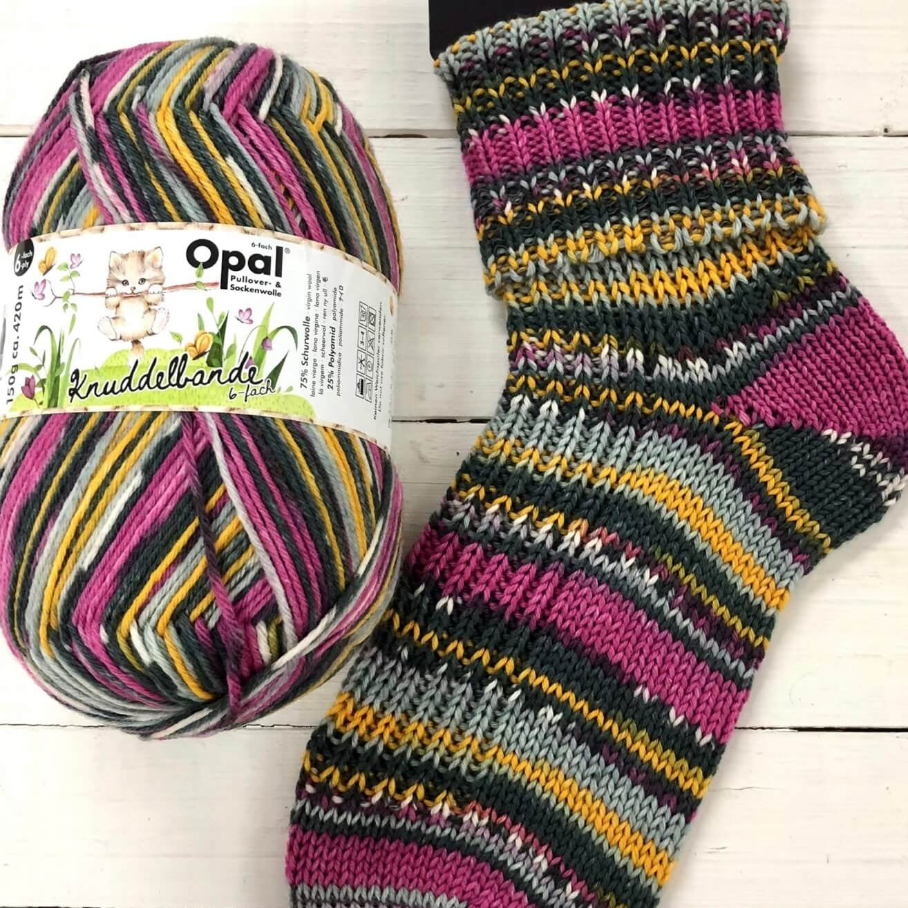 purple yellow knitted sock multicoloured opal 6ply sock wool yarn 