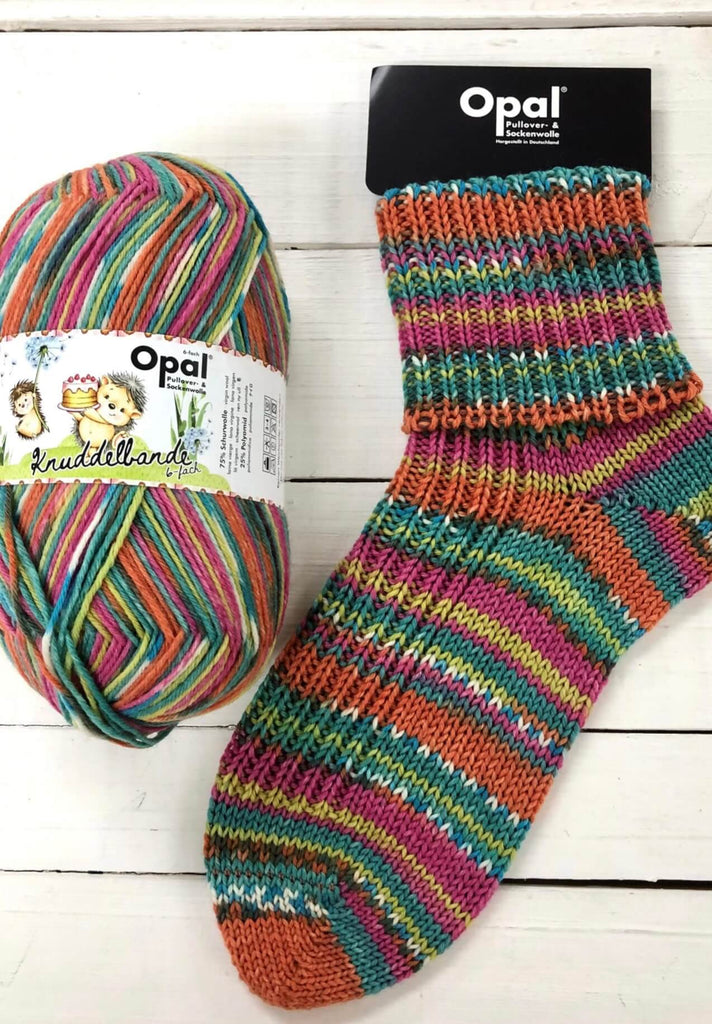 orange and green knitted sock multicoloured opal 6ply sock wool yarn 