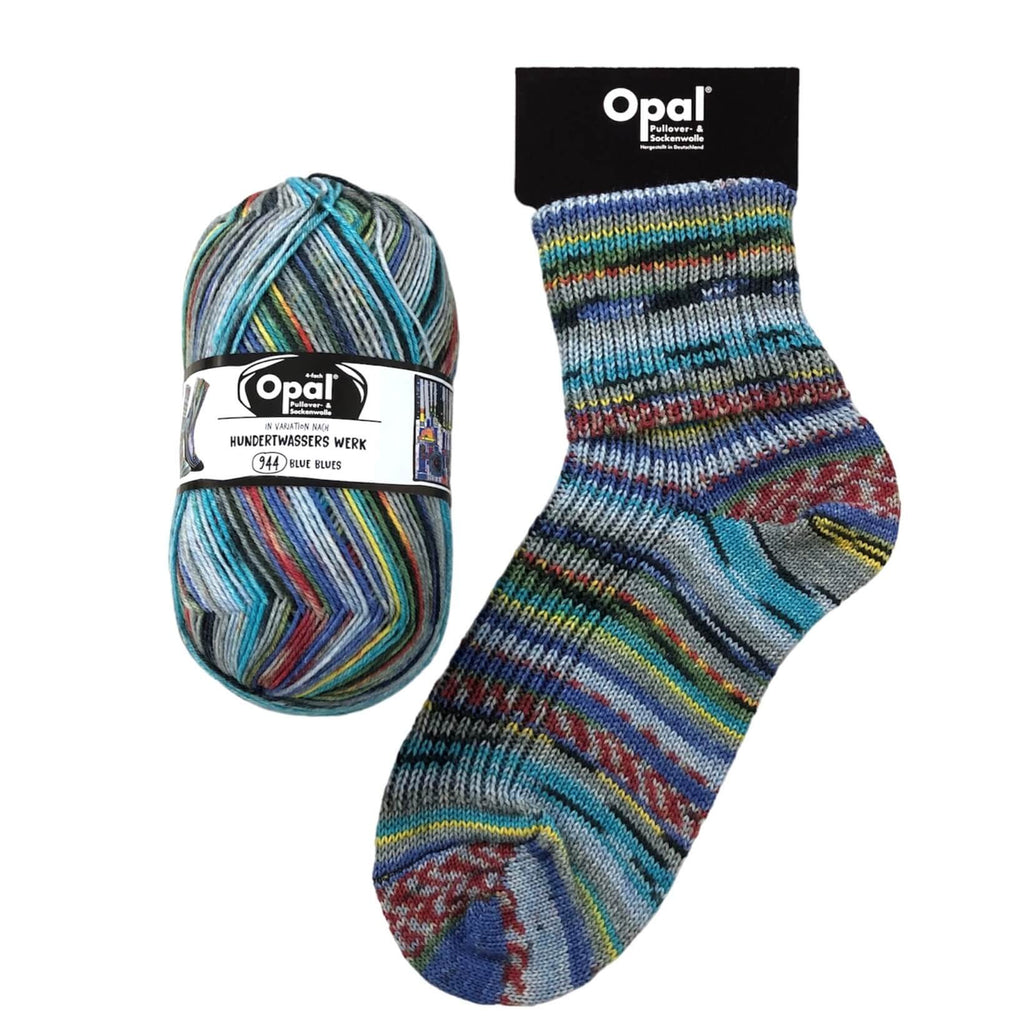 blue sock knitted in  multi coloured opal 4ply sock yarn wool inspired by the artist Hundertwasser