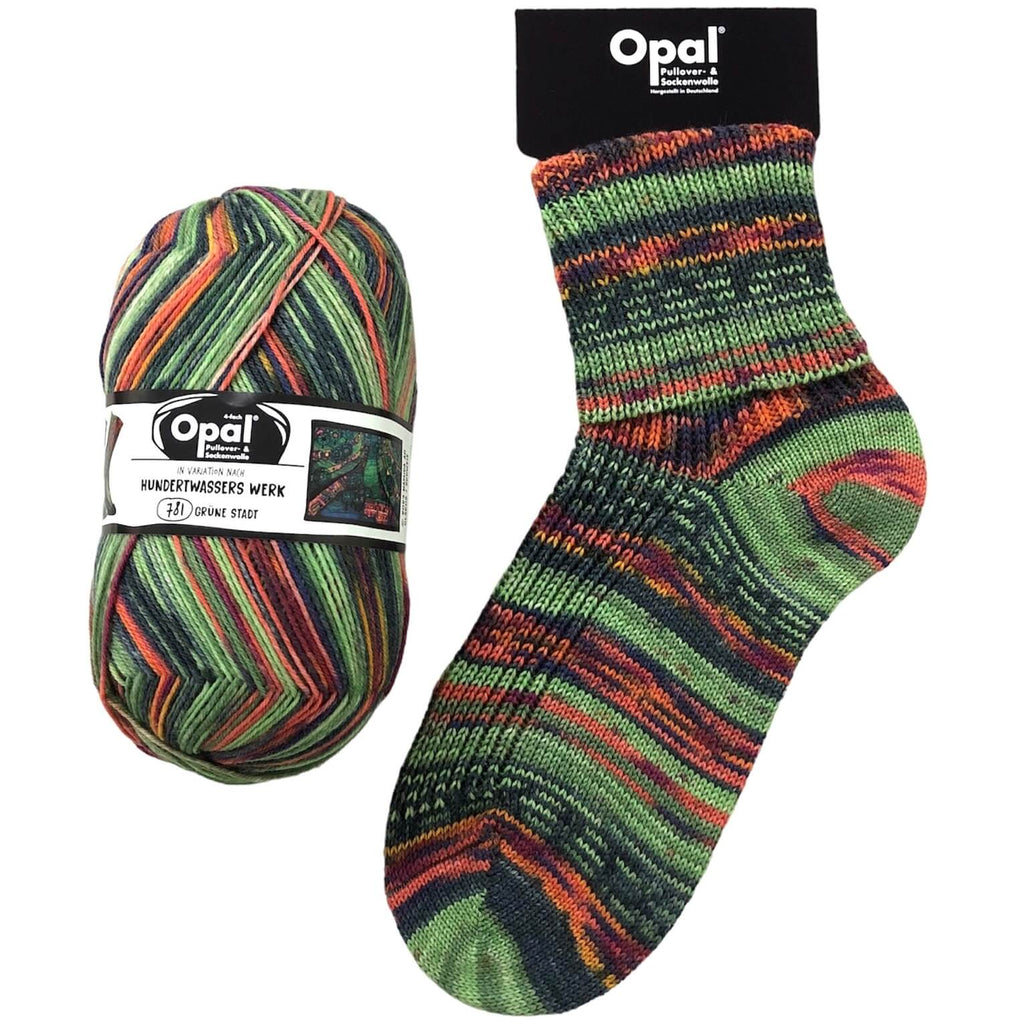 green sock knitted in  multi coloured opal 4ply sock yarn wool inspired by the artist Hundertwasser