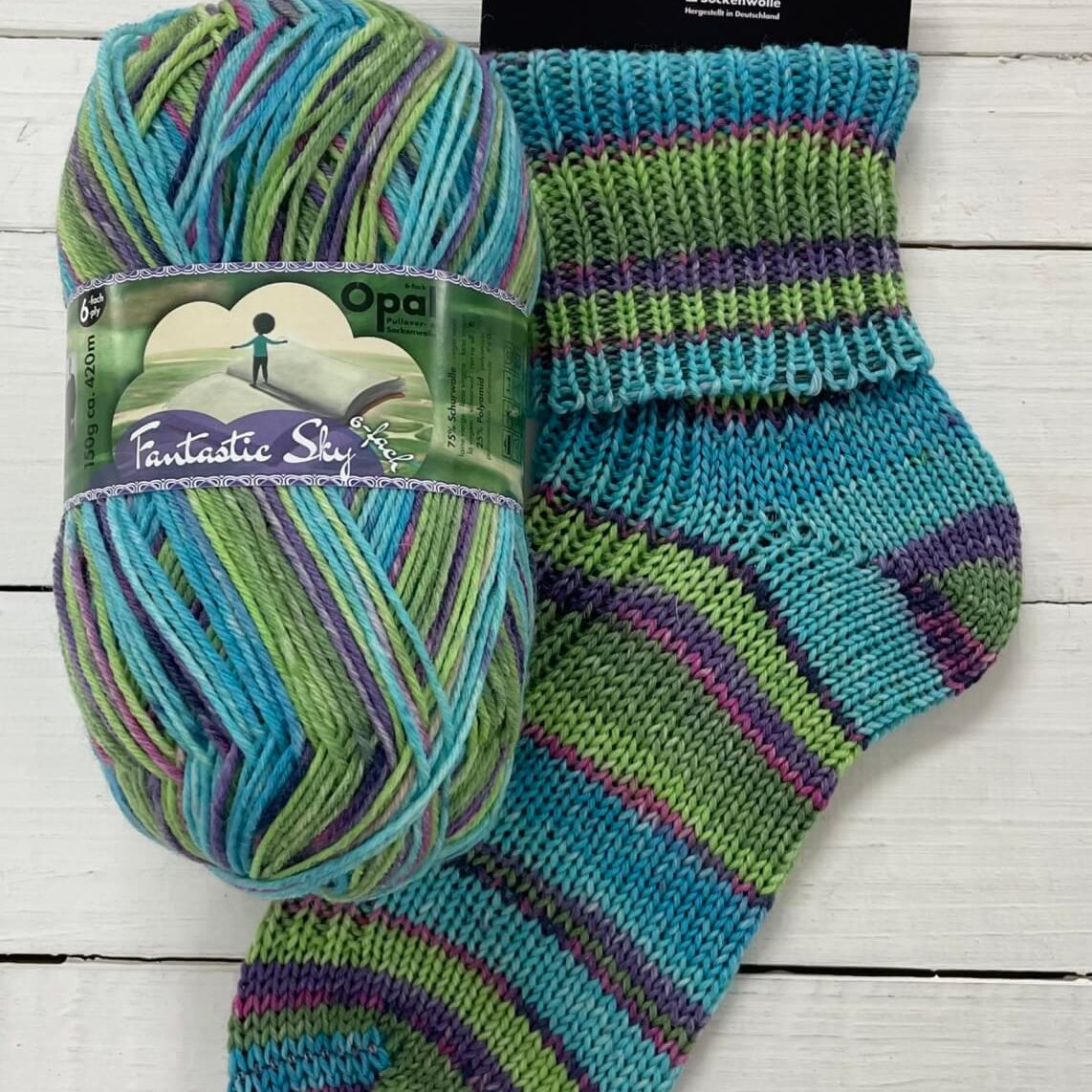turquoise and green knitted sock multicoloured opal 6ply sock wool yarn 