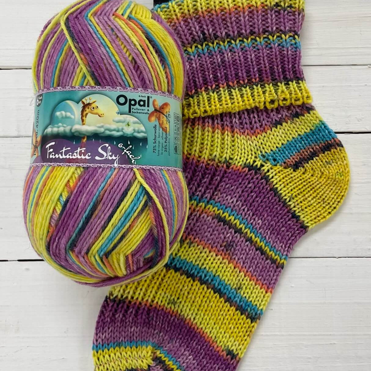 yellow and purple knitted sock multicoloured opal 6ply sock wool yarn 